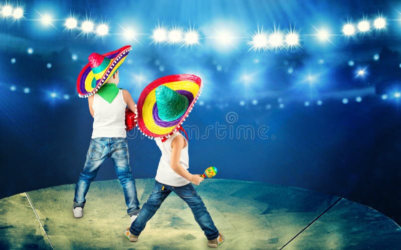 Mexican party. Two brothers in sombreros perform on stage, sing serenades. stock photo Mexican party. Two brothers in sombreros perform on stage, sing serenades. stock photo