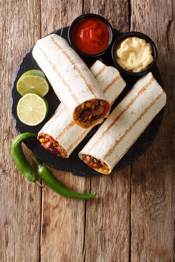 Mexican popular grilled burrito snack with beef and vegetables a royalty free stock photo Mexican popular grilled burrito snack with beef and vegetables a royalty free stock photo