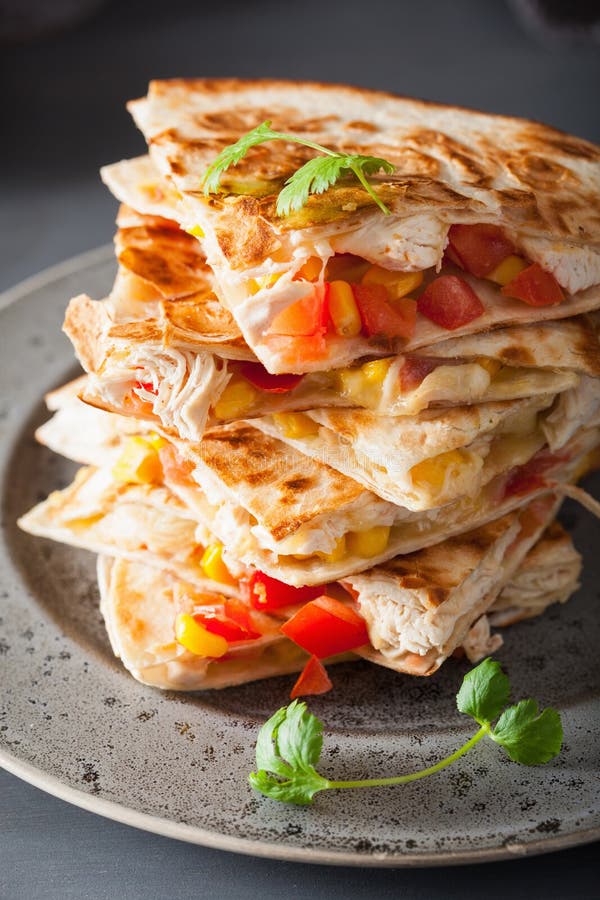 Mexican quesadilla with chicken, tomato, sweet corn and cheese