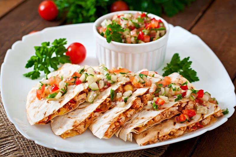 Mexican Quesadilla wrap with chicken, corn and sweet pepper stock photo