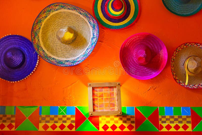 Sombreri messicani arancione muro.