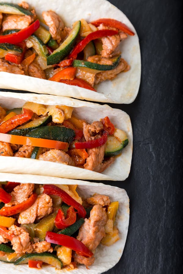 Mexican Tacos with Pork and Vegetables. Al Pastor Taco on Slate