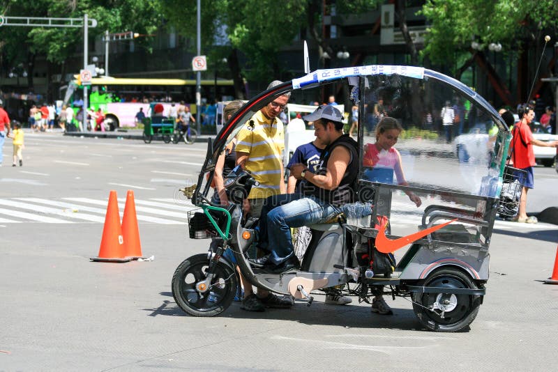 Mexico City Mexico 04 25 2010 A Vehicle Carrying People And Its mexico-city-mexico-04-25-2010-a-vehicle-carrying-people-and-its