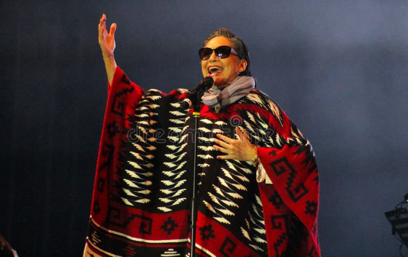 Mexican female singer Ofelia Medina singing dressed as the famous singer Chavela Vargas in a public event in mexico. Mexican female singer Ofelia Medina singing dressed as the famous singer Chavela Vargas in a public event in mexico