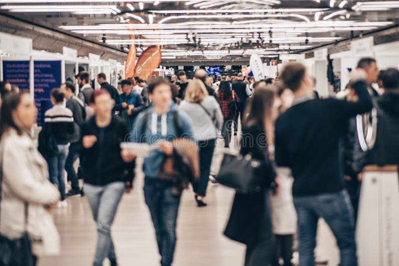 Abstract blurred people at exhibition hall of expo event trade show. Business convention show or job fair. Business stock image