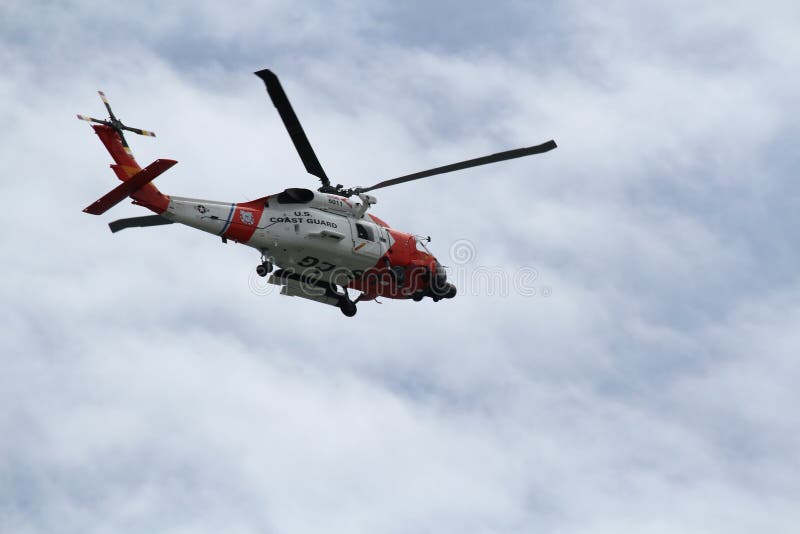 A MH-60J Jayhawk Medium Range Recovery flying overhead. A MH-60J Jayhawk Medium Range Recovery flying overhead