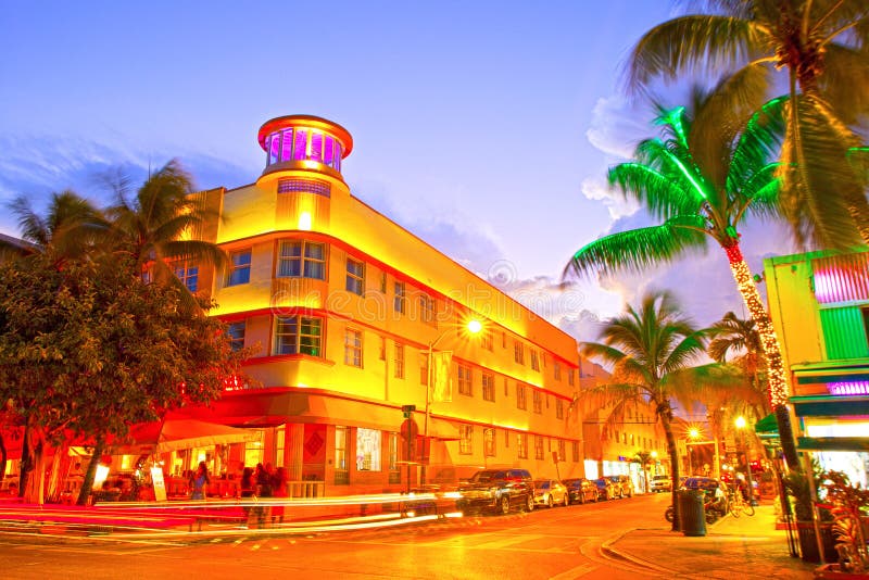 Miami Beach, Florida Moving traffic hotels and restaurants at sunset on Ocean Drive