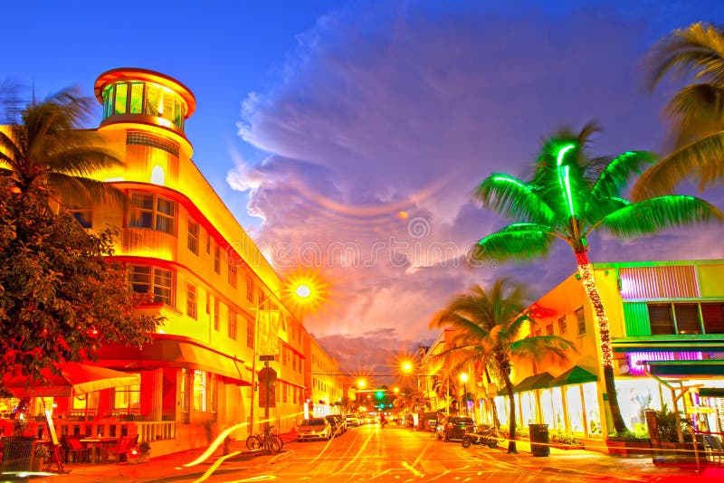 Miami Beach, Florida Moving traffic hotels and restaurants at sunset on Ocean Drive, world famous destination for it's nightlife, beautiful summer weather and pristine beaches