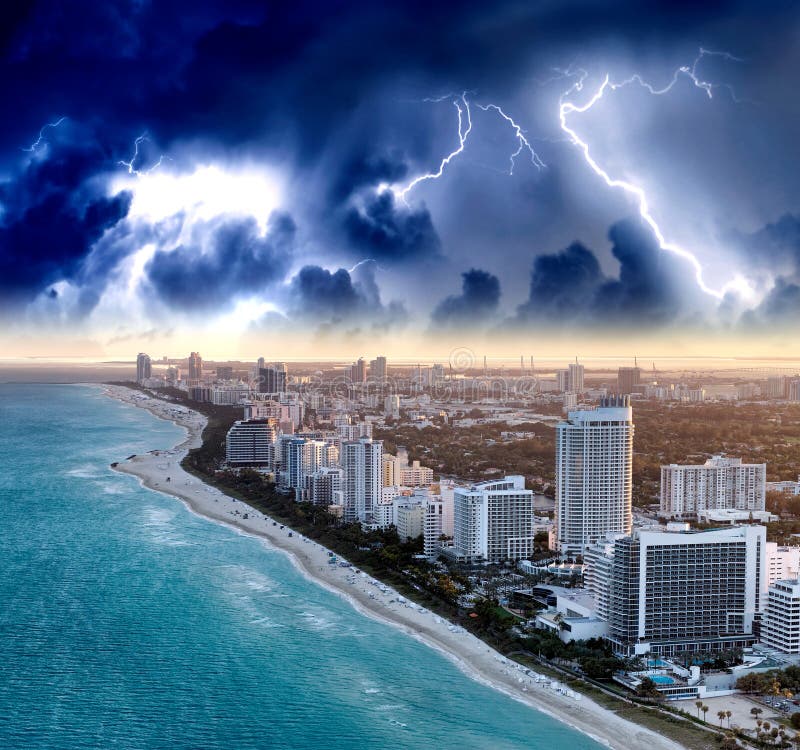 Amazing skyline of Miami Beach. Aerial view of city buildings from helicopter during a storm USA. Amazing skyline of Miami Beach. Aerial view of city buildings from helicopter during a storm USA