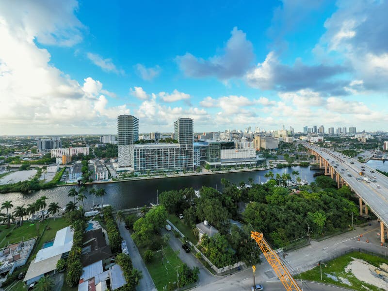 Miami, FL, USA - September 15, 2020: Miami River Landing a mixed use residential and commercial development by downtown. Miami, FL, USA - September 15, 2020: Miami River Landing a mixed use residential and commercial development by downtown