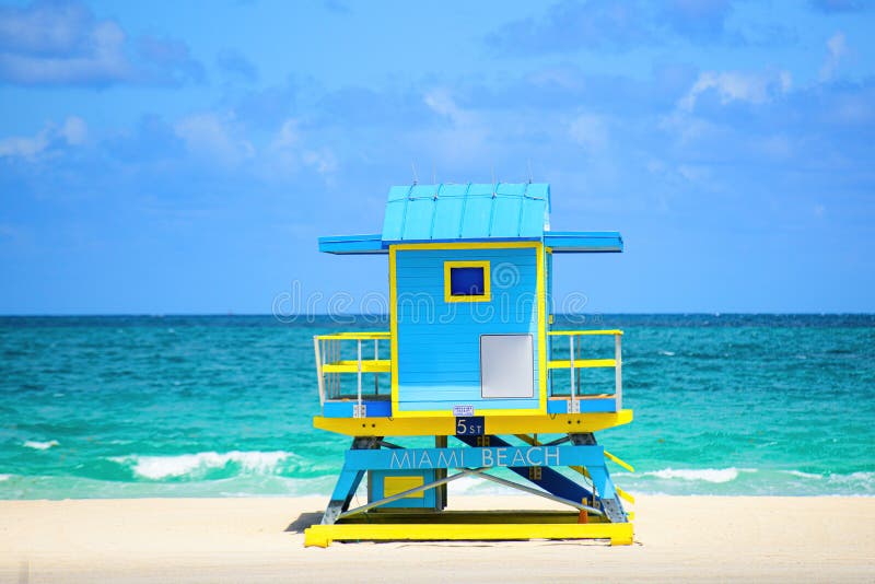 Miami South Beach skyline. Lifeguard tower in colorful Art Deco style and Atlantic Ocean at sunshine.