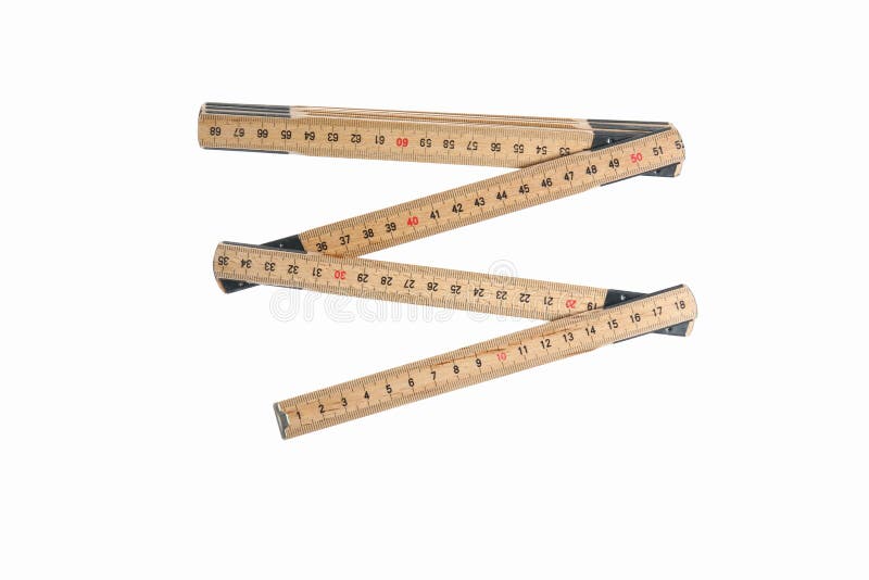 A ruler also known as an yardstick on a white background. A ruler also known as an yardstick on a white background