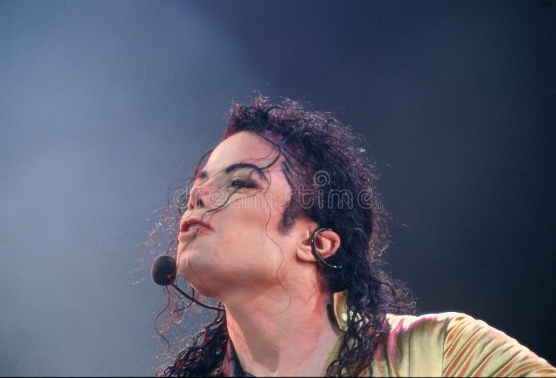 Michael Joseph Jackson singing in his concert isolated on white background. King of Pop photo grubicy. Michael Joseph Jackson singing in his concert isolated on white background. King of Pop photo grubicy