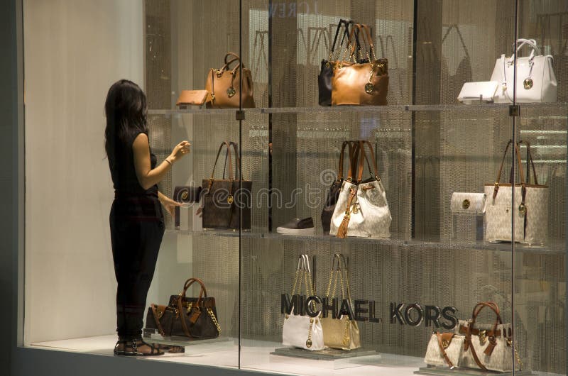 michael kors handbags department store shop worker was decorating window shop alderwood mall lynnwood near seattle 52669234