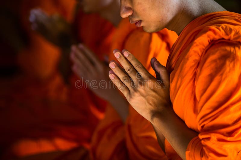 Monks Praying at the Marble Temple in Bangkok, Thailand. Monks Praying at the Marble Temple in Bangkok, Thailand.