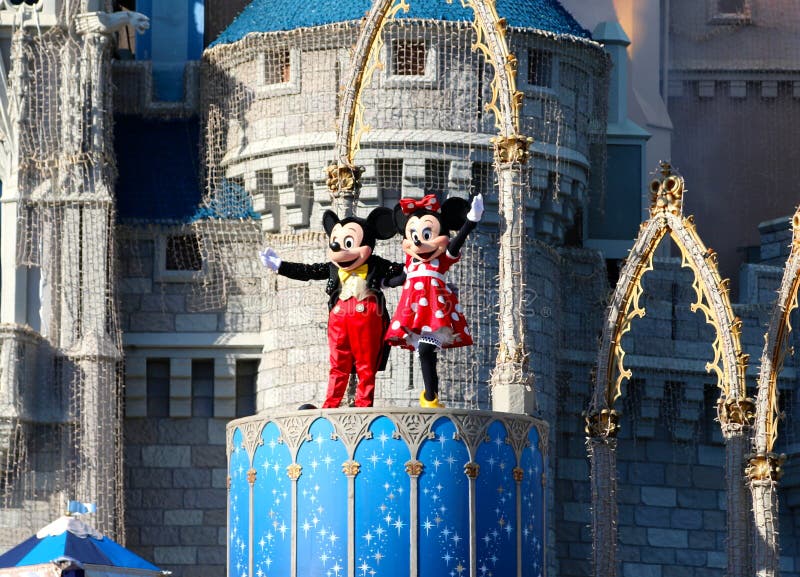 Mickey and Minnie Mouse on stage and waving on stage at Disney World in Orlando Florida. Mickey and Minnie Mouse on stage and waving on stage at Disney World in Orlando Florida.