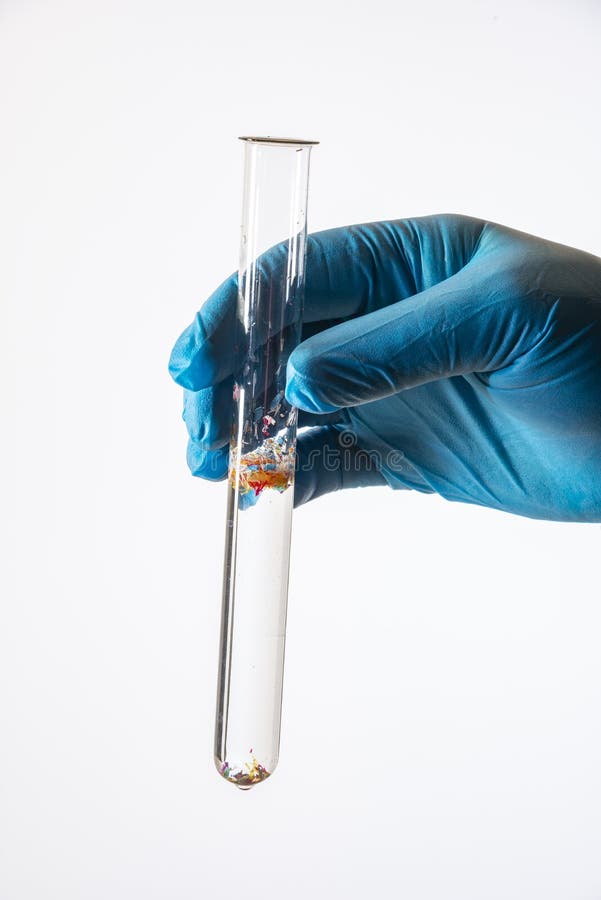Micro Plastics in a Test Tube with Drinking Water Stock Photo Image