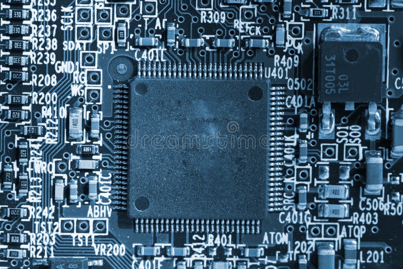 Microchip background - close-up of electronic circuit board royalty free stock photography