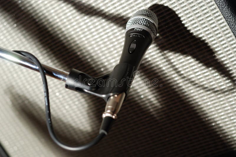 Microfone and guitar shadow royalty free stock photos