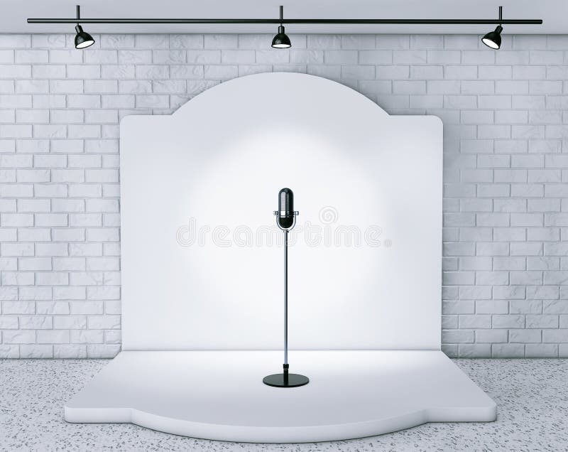 Microfono d'annata che sta su una fase vuota fotografia stock Microfono d'annata che sta su una fase vuota fotografia stock