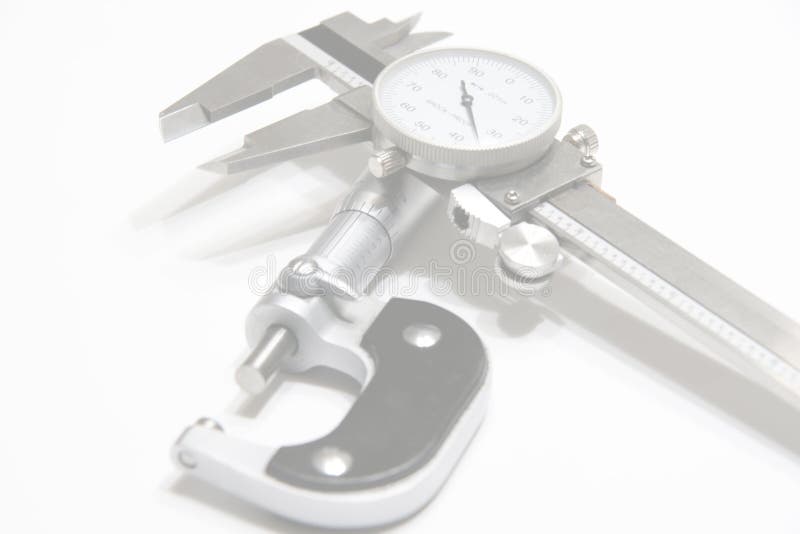 Micrometer and Caliper Web Background. Micrometer and caliper picture for web background or banner stock images