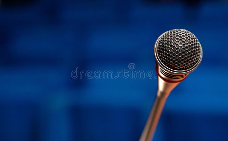 Microphone in conference hall royalty free stock image