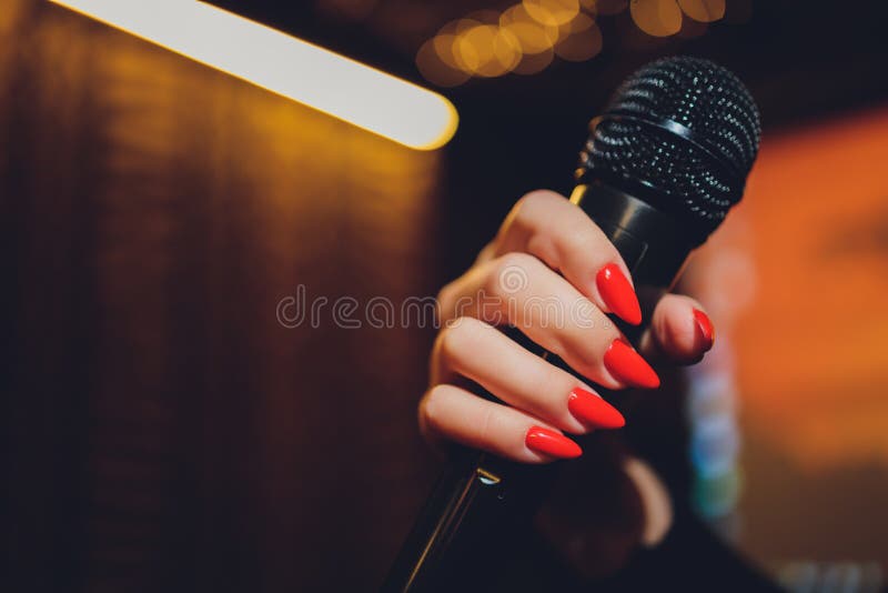 Microphone And Female Singer Close Up Woman Singing Into A Microphone