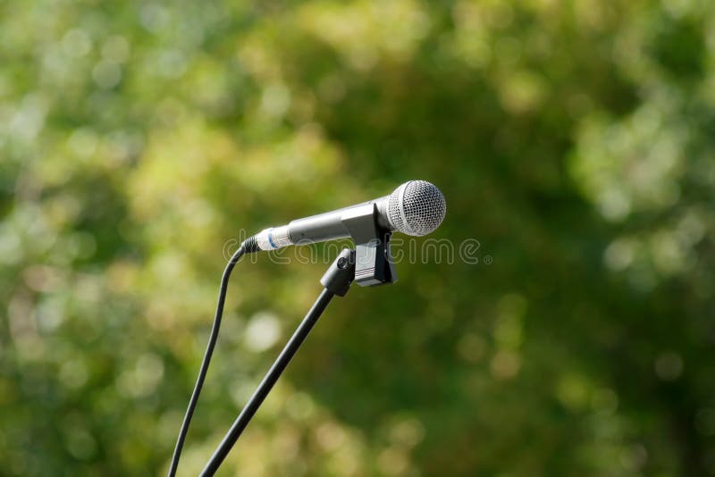 Microphone on green background