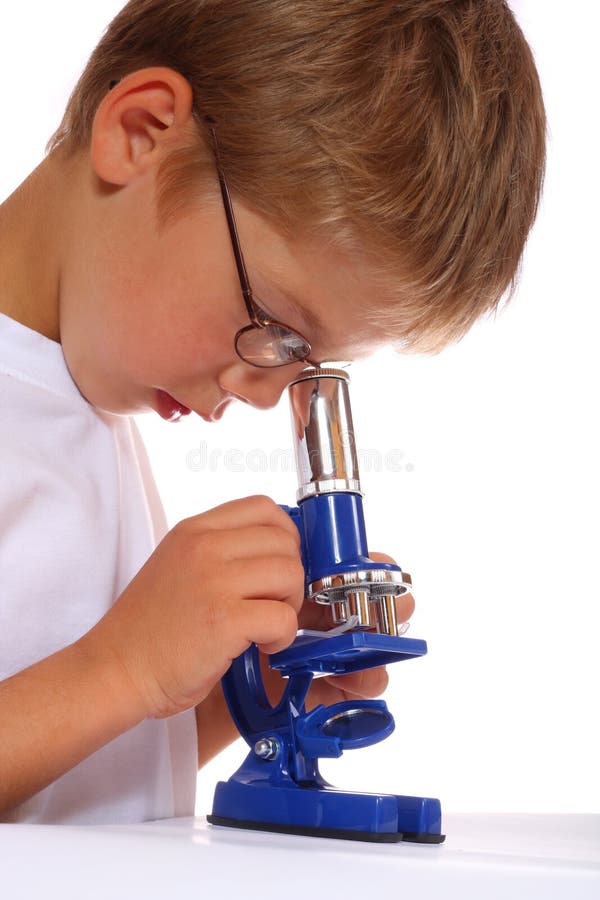 Microscope de garçon images stock