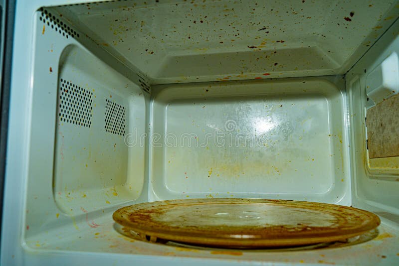 Microwave Contaminated during Operation. Residues and Particles of Food
