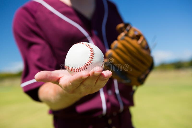 MId Section of Baseball Pitcher Holding Ball on Palm Stock Image