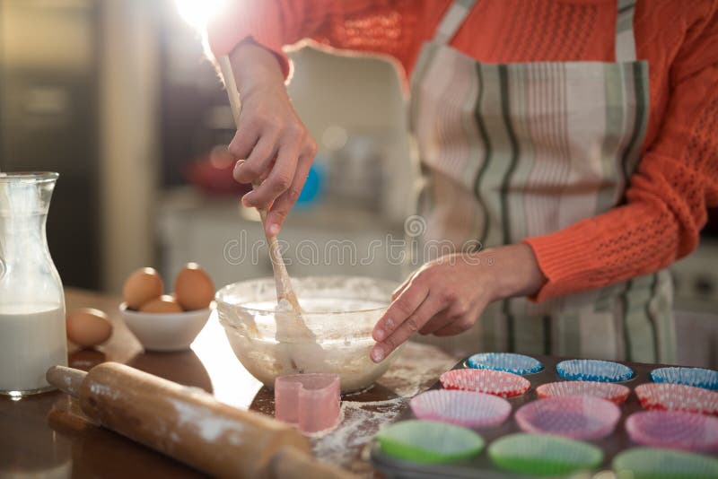 Woman Mixing Eggs and Wheat Flour in a Bowl Stock Image Image of