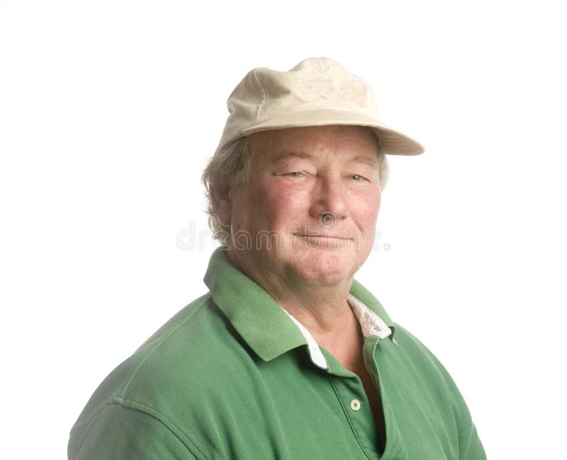 Midden leeftijds hogere mens die het toevallige hoed glimlachen draagt stock fotografie Midden leeftijds hogere mens die het toevallige hoed glimlachen draagt stock fotografie