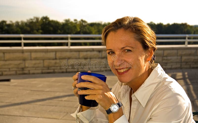 Middle Age Woman Drinking Coffee