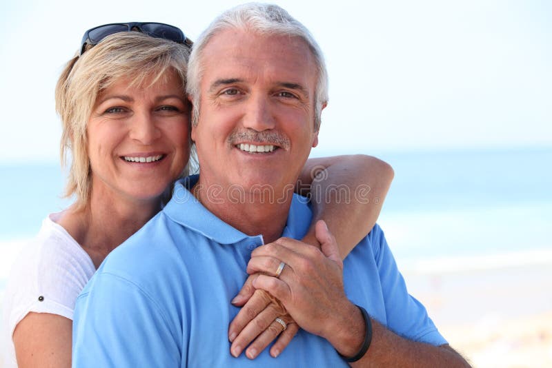 Middle-aged couple at the coast