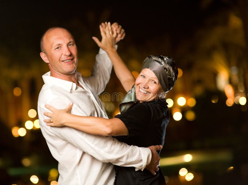 Middle-aged couple dancing