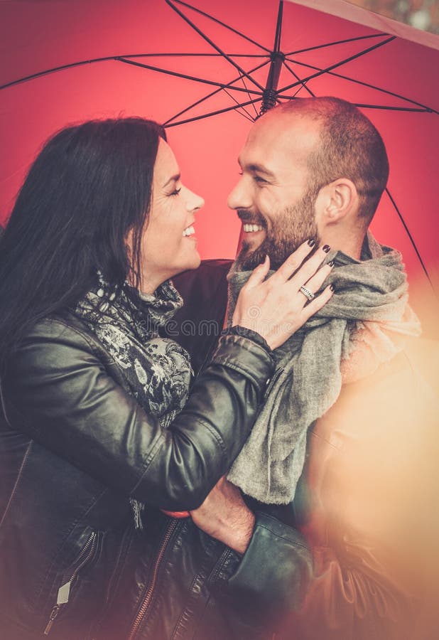 Middle-aged couple outdoors on autumn day