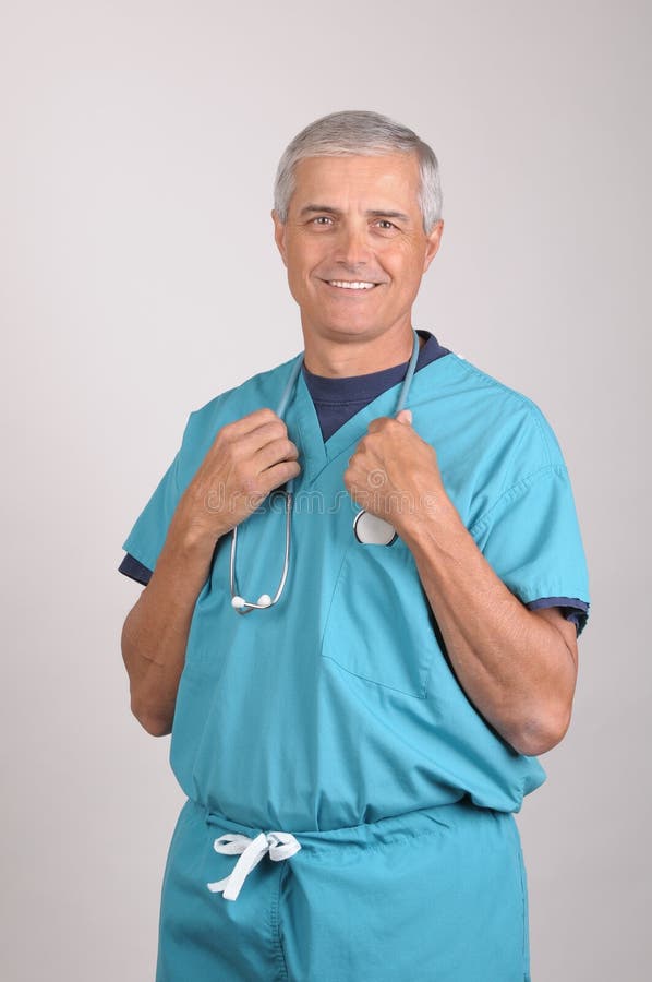 Middle Aged Doctor in Scrubs with Stethoscope Stock Image Image of