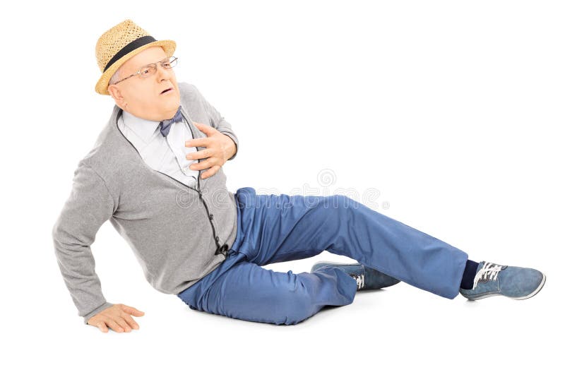 Middle aged gentleman laying on the ground having a heart attack