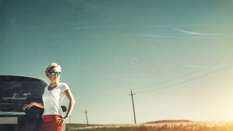 Middle aged independent woman enjoys road adventure. Toned Image with scratches and copy-space. Vacation, motivation, well-being, stock images Middle aged independent woman enjoys road adventure. Toned Image with scratches and copy-space. Vacation, motivation, well-being, stock images