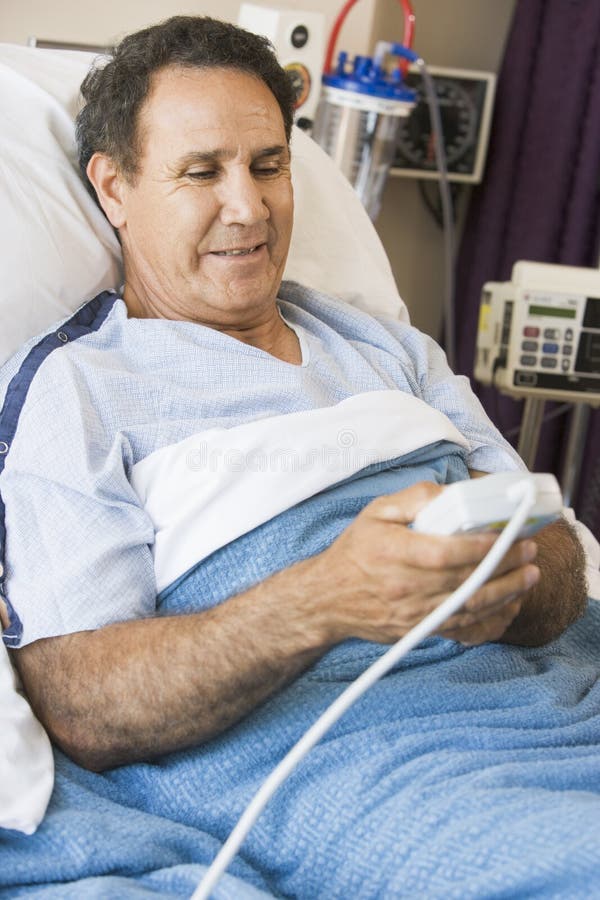 Middle Aged Man Lying in Hospital Bed Stock Image Image of vertical