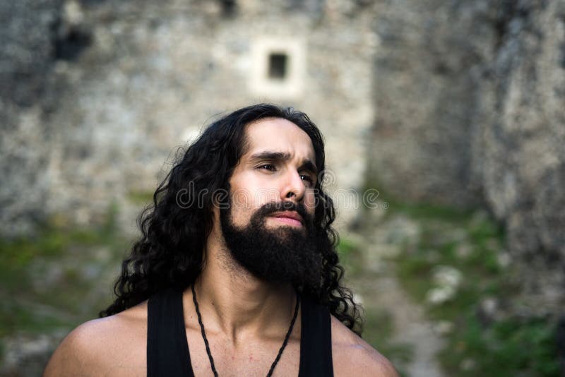 Middle-aged Man with Long Hairstyle. Sad Frustrated Man with Long Dark Wavy  Hair and Beard Looking Far Away Stock Photo - Image of people, masculinity:  164287920