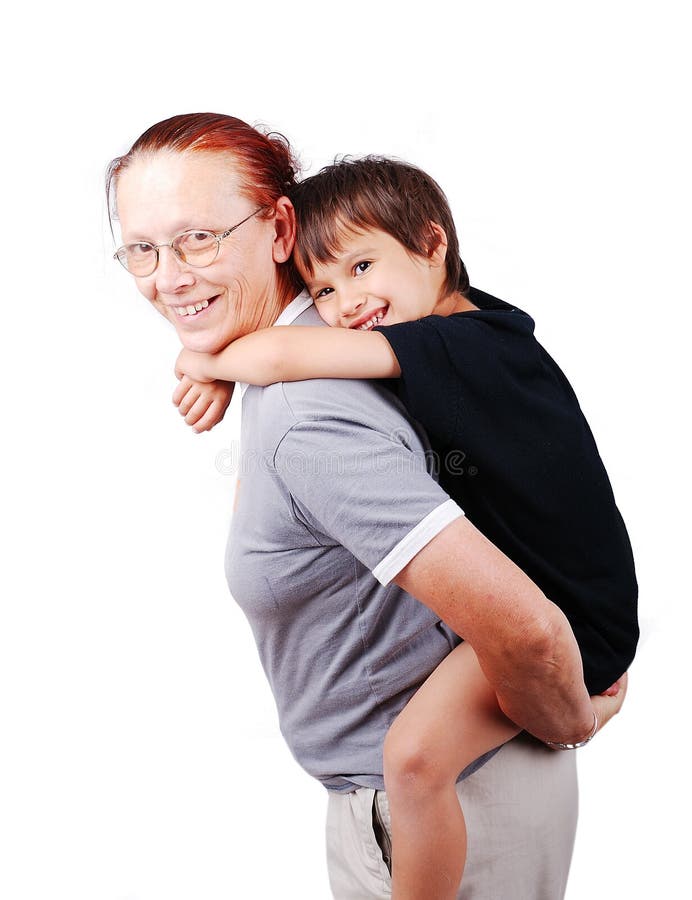 Middle aged woman holding little boy