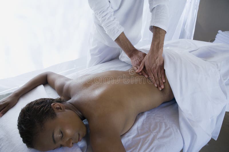 Middle Aged Woman Receiving Back Massage