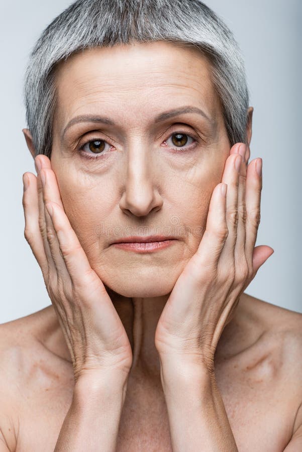 Middle Aged Woman Touching Cheeks Isolated Stock Image Image Of Skin Caucasian 243139521 