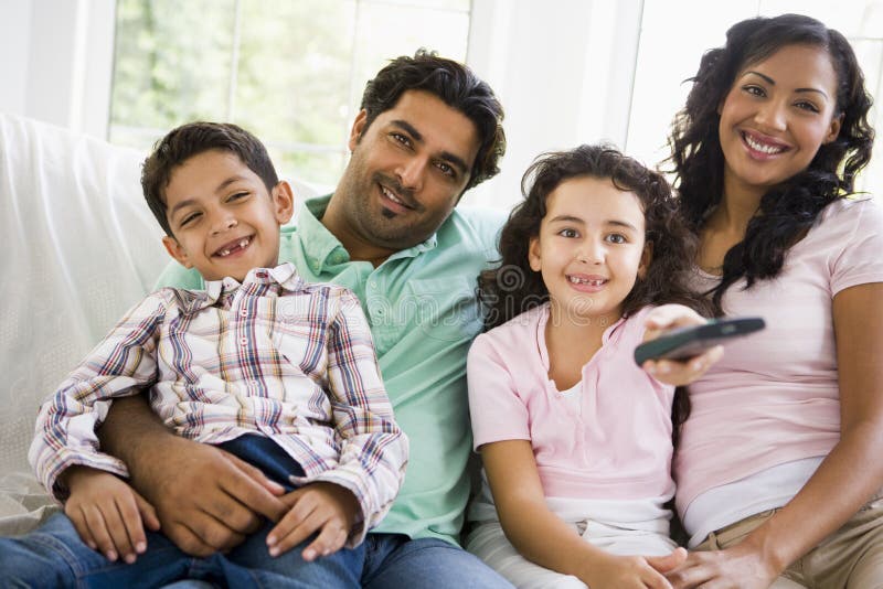Middle Eastern family watching television stock image