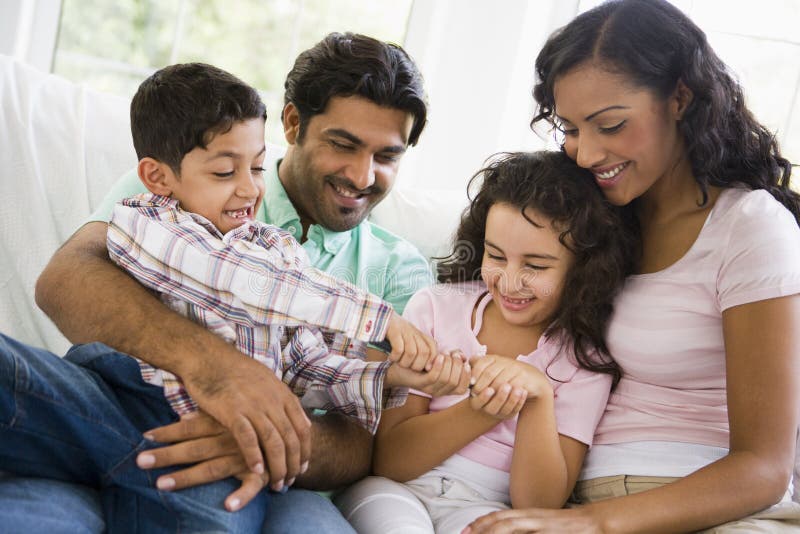 Middle Eastern family watching television royalty free stock photography