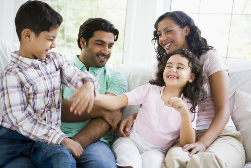 Middle Eastern family watching television royalty free stock photos