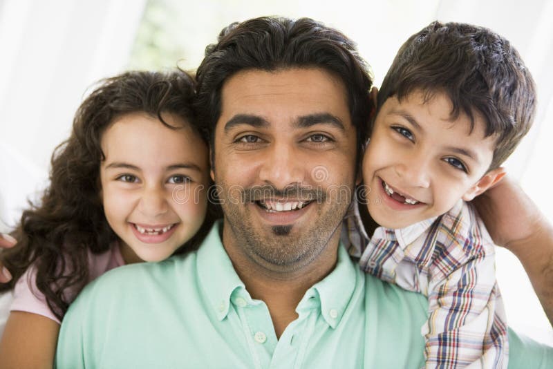 A Middle Eastern man with his children royalty free stock image A Middle Eastern man with his children royalty free stock image