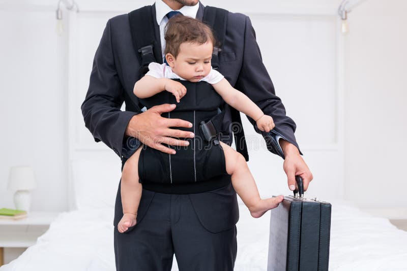 Midsection of Father Carrying Baby while Holding Briefcase Stock Photo Image of family, house